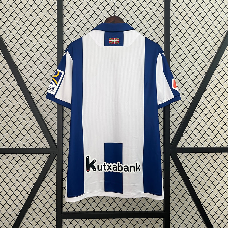 Camisa Real Sociedad Home 24/25 - Macron Torcedor Masculina Lançamento